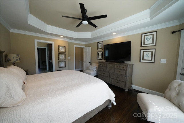 bedroom with ceiling fan, baseboards, dark wood-style floors, a raised ceiling, and crown molding