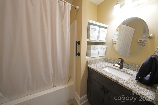 bathroom with shower / bath combination with curtain and vanity