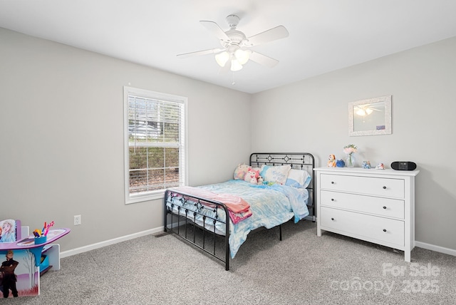 bedroom featuring baseboards, a ceiling fan, and light colored carpet