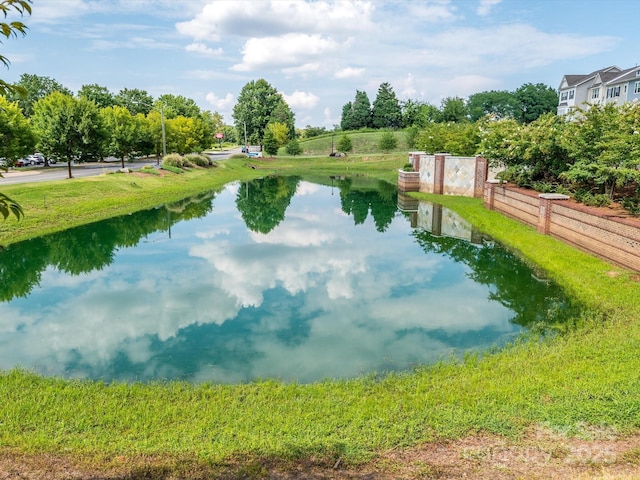 view of water feature featuring fence