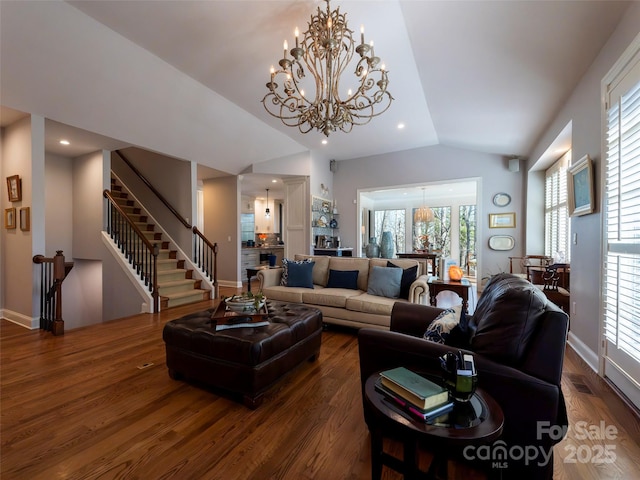 living room with vaulted ceiling, dark wood finished floors, stairs, and baseboards