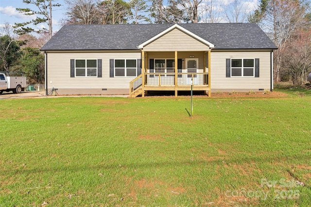 view of front of house with a front yard, crawl space, covered porch, and roof with shingles