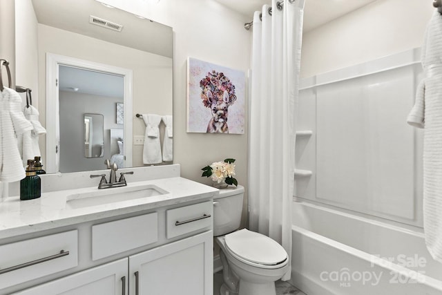 bathroom featuring toilet, visible vents, shower / tub combo with curtain, and vanity