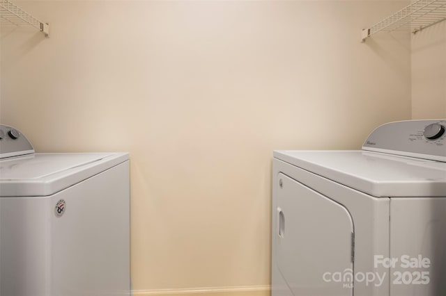 laundry area featuring laundry area and washing machine and clothes dryer