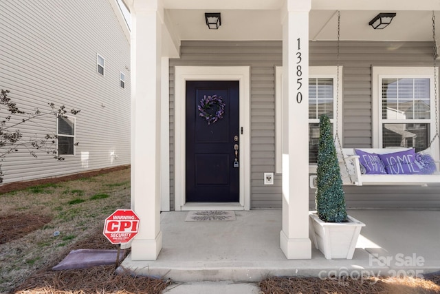 property entrance with a porch