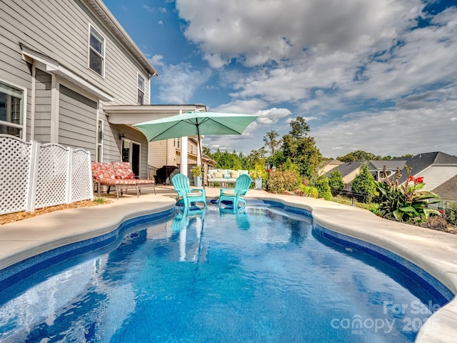 pool featuring a patio