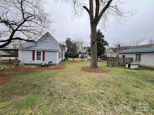 view of yard with fence