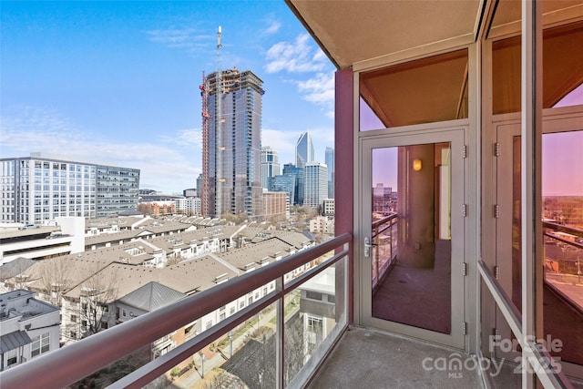 balcony featuring a city view