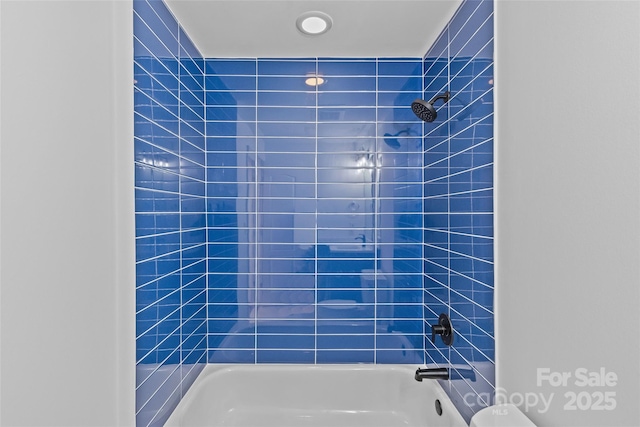 full bathroom with shower / washtub combination