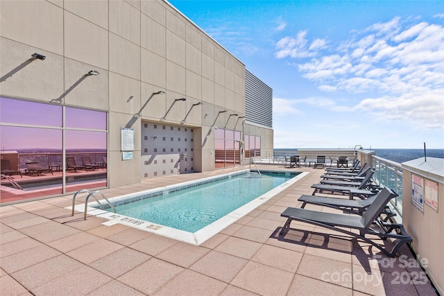 community pool featuring a patio