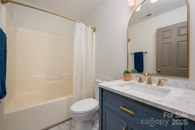 bathroom with toilet, vanity, visible vents, marble finish floor, and shower / bath combo with shower curtain