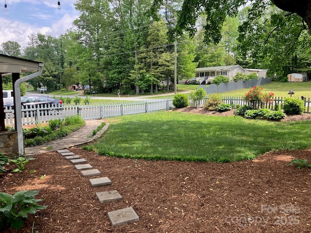 view of yard with fence