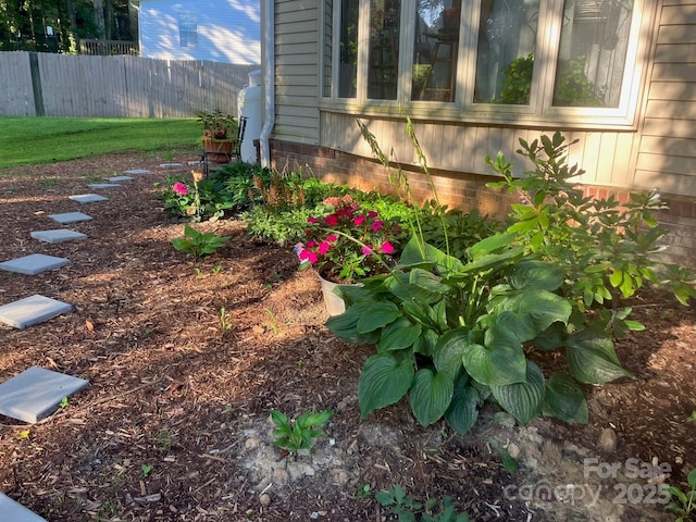 view of yard with fence