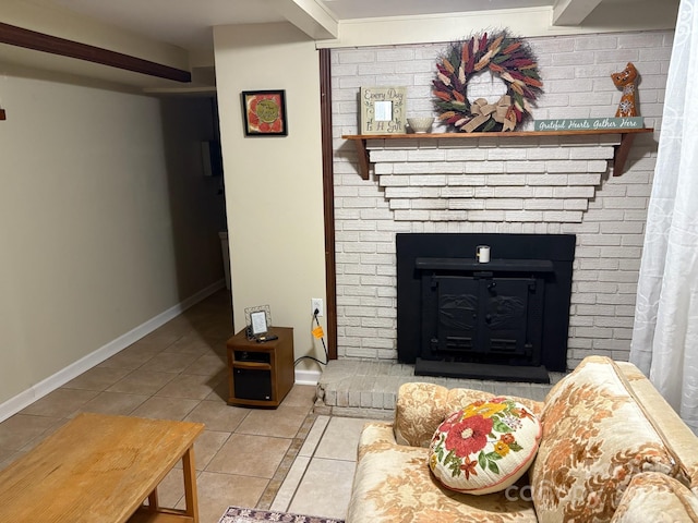 living area with a fireplace, tile patterned flooring, and baseboards