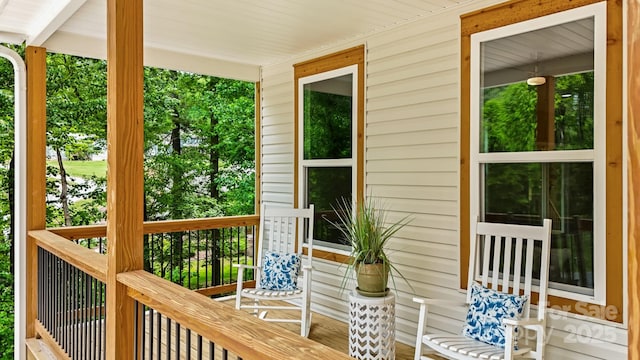 wooden terrace with covered porch