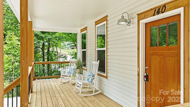 deck with covered porch