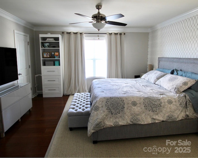 bedroom featuring wallpapered walls, ornamental molding, dark wood finished floors, and a ceiling fan