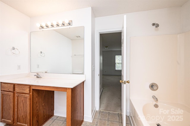 full bathroom featuring vanity and bathing tub / shower combination