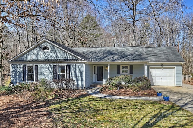 ranch-style house with a garage, driveway, and a front yard