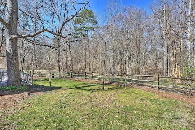 view of yard featuring fence