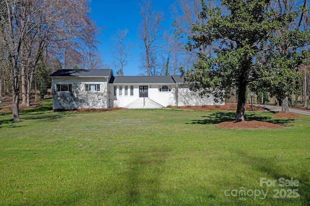 exterior space with a lawn