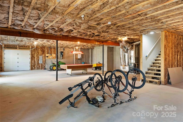 basement with billiards, electric panel, and stairway