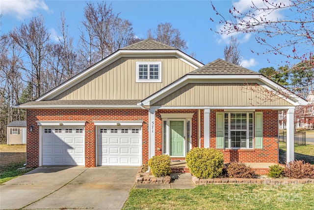 view of front of home featuring concrete driveway, brick siding, roof with shingles, and an attached garage