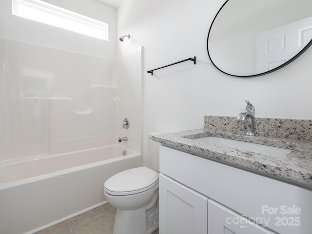 full bath featuring shower / bathtub combination, vanity, toilet, and tile patterned floors