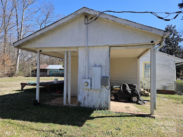 view of home's exterior featuring a lawn