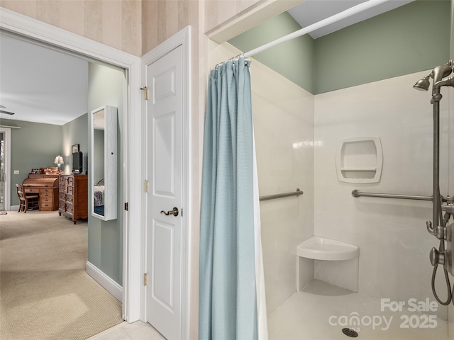 full bathroom with curtained shower, ensuite bath, and baseboards