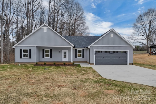 view of front of property featuring driveway, a porch, a shingled roof, a front lawn, and a garage