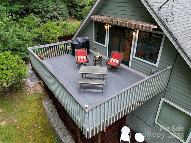 wooden terrace featuring stairs