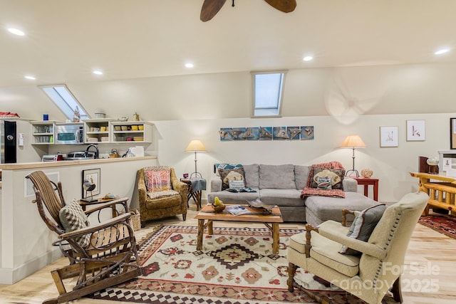 living room with light wood-style flooring, recessed lighting, and ceiling fan