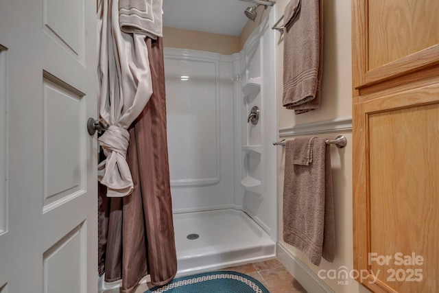 bathroom featuring a stall shower