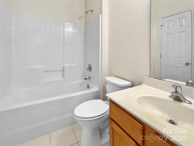 bathroom with tub / shower combination, vanity, toilet, and tile patterned floors