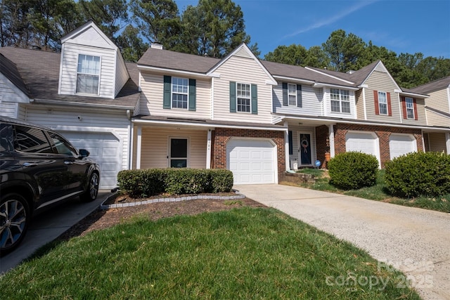 townhome / multi-family property featuring a chimney, a shingled roof, driveway, brick siding, and a garage