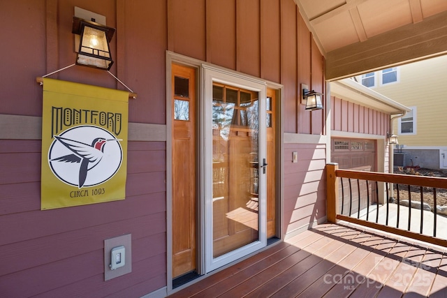 property entrance with board and batten siding