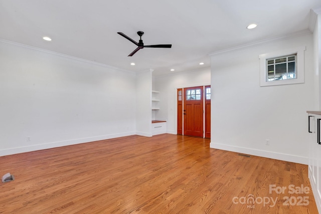 unfurnished living room featuring baseboards, ceiling fan, ornamental molding, recessed lighting, and light wood-style flooring