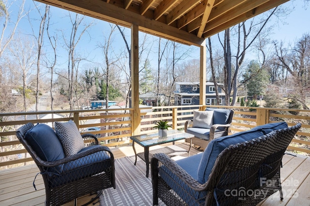 wooden deck featuring an outdoor living space