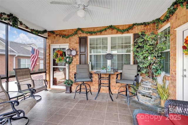 view of patio / terrace featuring ceiling fan