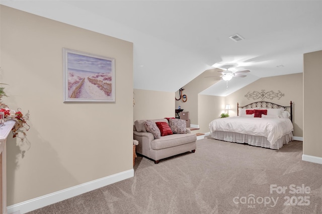 carpeted bedroom with visible vents, a ceiling fan, baseboards, and vaulted ceiling