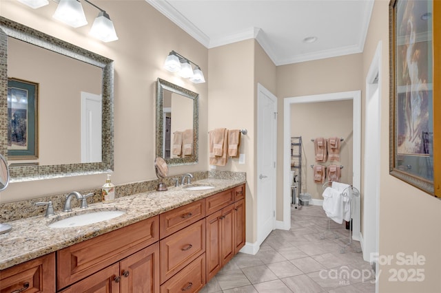 full bathroom featuring tile patterned flooring, crown molding, double vanity, and a sink