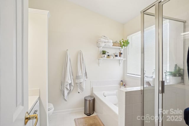 full bathroom with toilet, a stall shower, baseboards, a bath, and vanity