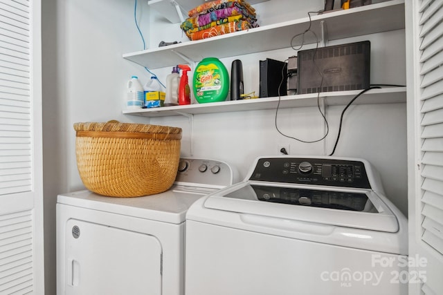 laundry room featuring laundry area and separate washer and dryer