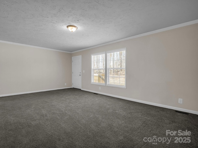 empty room with baseboards, dark carpet, and ornamental molding