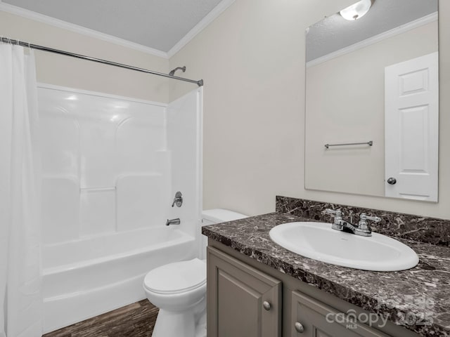 full bathroom featuring toilet, ornamental molding, shower / tub combo, vanity, and wood finished floors