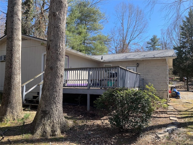 rear view of house with a deck