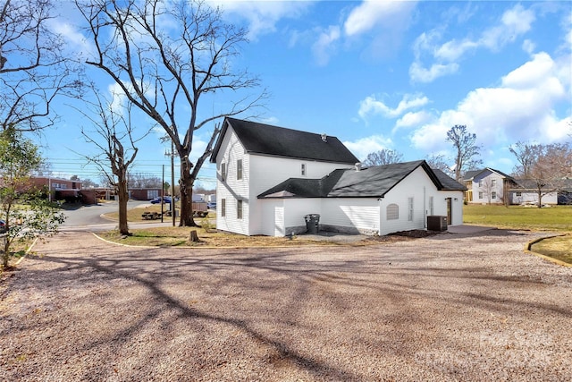 view of side of home featuring a residential view