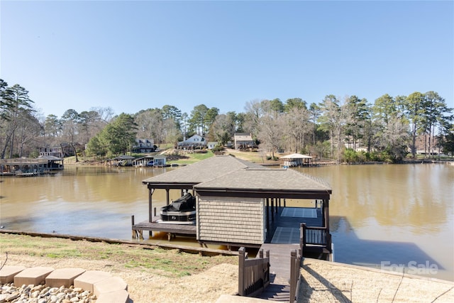 dock area featuring a water view and boat lift