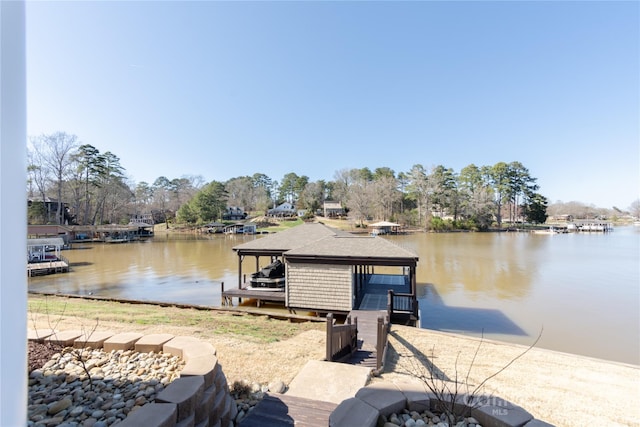 dock area featuring a water view